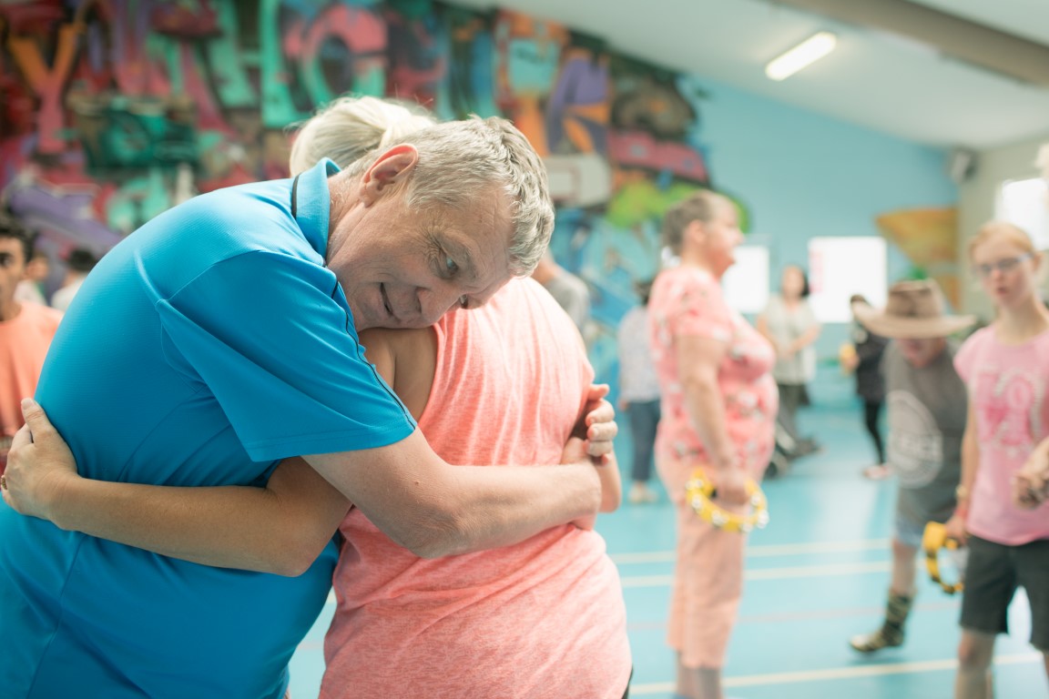 Two people hugging